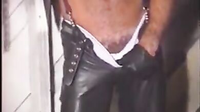Gay man with big hard dong fucks his lover in fetish scene