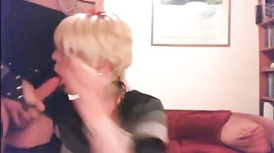 Clothed Crossdressers Suck Each Other Off